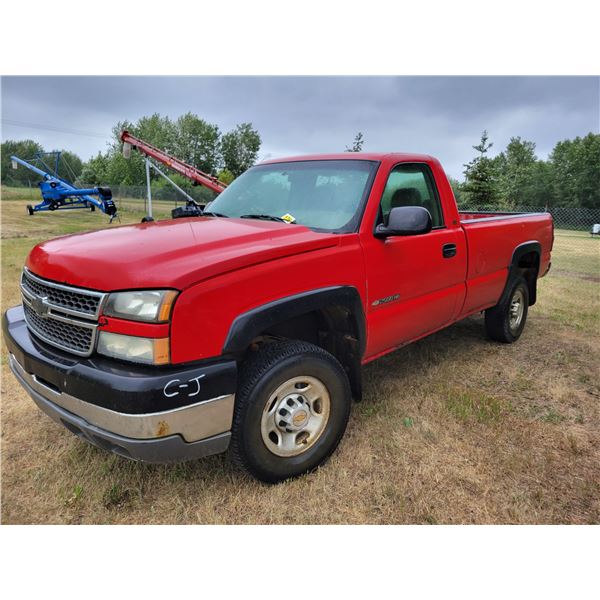 2005 Chev. 2500 Red, Reg cab, V8 Auto, 2x4, Red, 279,490 Km, Air, rear hitch, Spare Tire. SN.1GCHC24