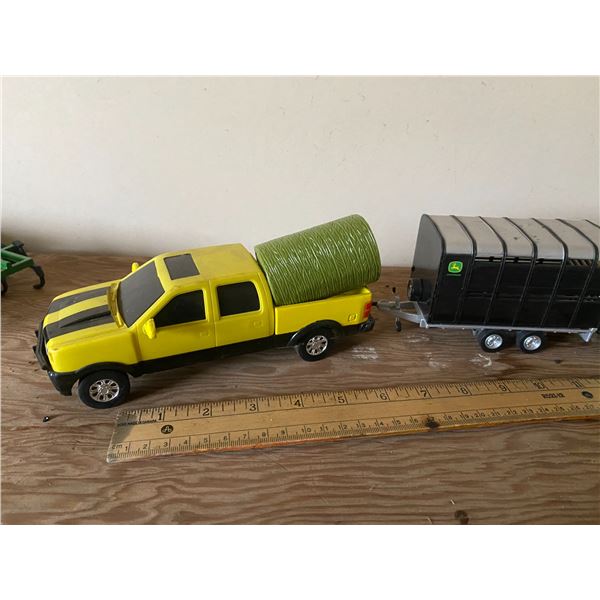 Yellow truck c/w bale & JD stock trailer