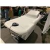 Image 2 : MIDMARK RITTER COMMERCIAL POWERED MULTI ADJUSTABLE FOOT CONTROL OPERATED MEDICAL / SPA BED