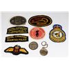 LOT OF ASSORTED MILITARY AND POLICE CLOTH INSIGNIA