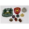 Image 1 : LARGE BUNDLE OF ASSORTED MILITARY CAP BADGES,