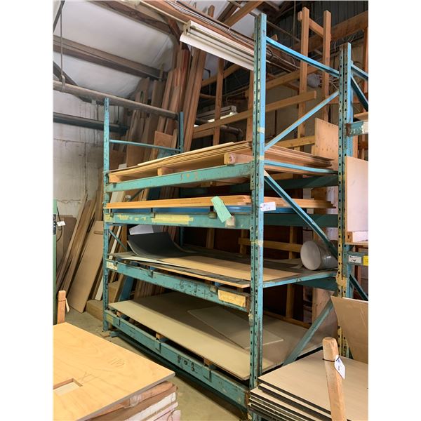 2 BLUE PALLET RACKING SECTIONS APPROX.9'H X 4'W WITH ASSORTED WOOD SHEETS