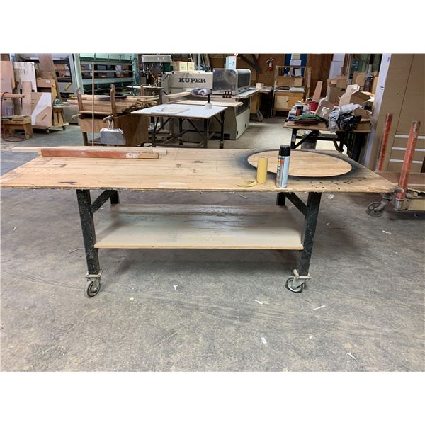 ROLLING WORK TABLE - STEEL FRAME WITH APPROX.8FT X 3 1/2FT PLYWOOD TOP