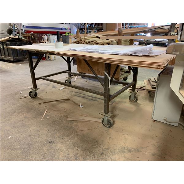 ROLLING WORK TABLE - STEEL FRAME WITH APPROX.8FT X 3 1/2FT PLYWOOD TOP