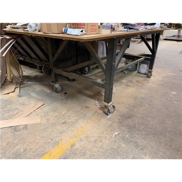 ROLLING WORK TABLE - STEEL FRAME WITH APPROX.8FT X 3 1/2FT PLYWOOD TOP