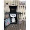 Image 6 : Dyna-Glo Premium BBQ, Two Propane Tanks (One Full), BBQ Tools, Cover, Welcome Bear & Cowboy Wall Déc