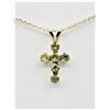 Image 1 : 10KT. YELLOW GOLD NATURAL PERIDOT CROSS PENDANT WITH STERLING SILVER CHAIN, 6 PERIDOT (0.42CTS), W/A