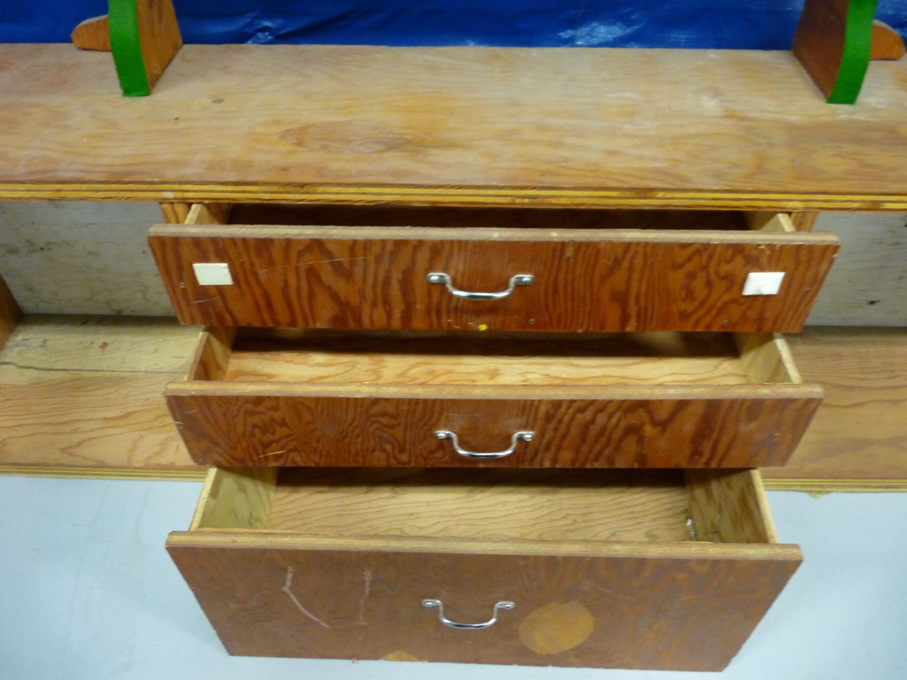 Home made gun rack with 3 drawer storage