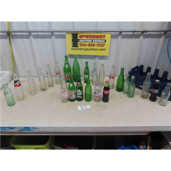 24 Assorted Pop Bottles; 7Up, Frostie, Pepsi, Crush, Coke, plus more