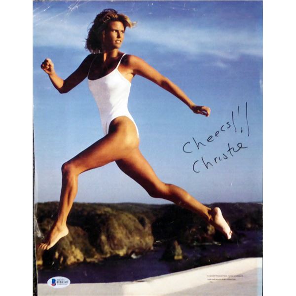 CHRISTIE BRINKLEY SIGNED SPORTS ILLUSTRATED 8 X 10 (BECKETT COA)