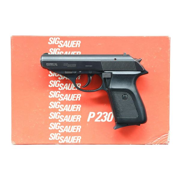 SIG SAUER MODEL P230 PISTOL IN FACTORY BOX.