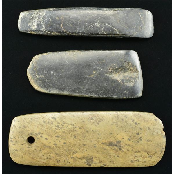 THREE AMERICAN INDIAN POLISHED STONE AXES.