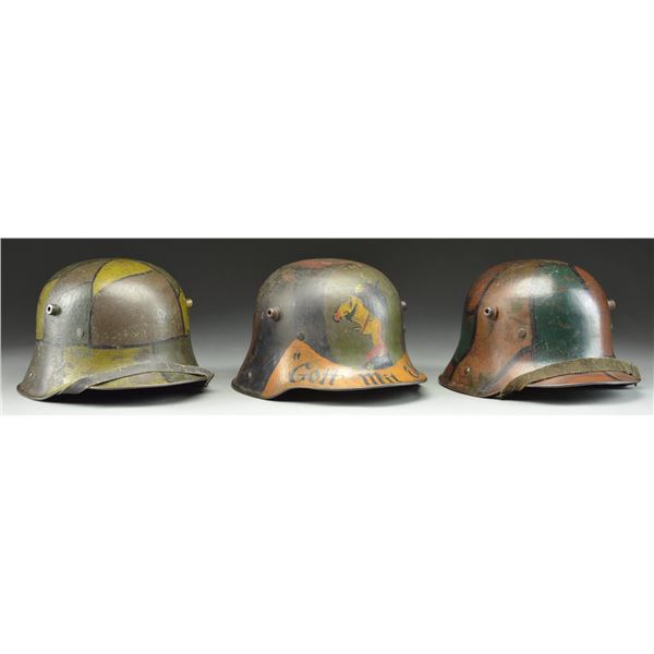 3 WWI GERMAN M1916/17 CAMOUFLAGE HELMETS.