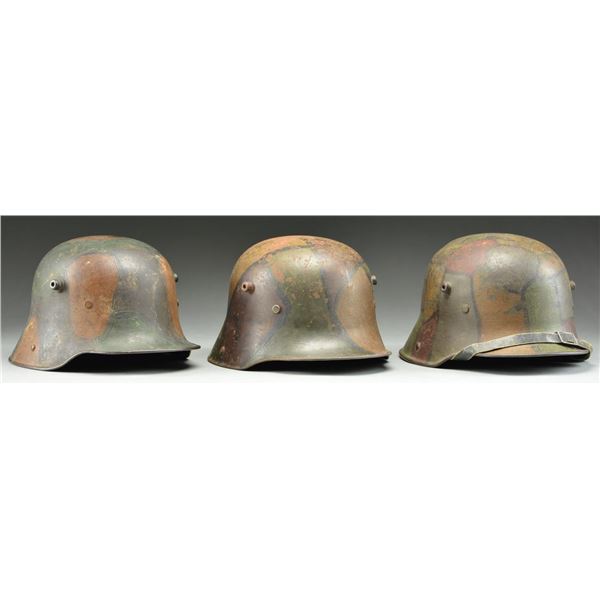 3 WWI GERMAN M1916/17 CAMOUFLAGE HELMETS.