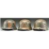 Image 2 : 3 WWI GERMAN M1916/17 CAMOUFLAGE HELMETS.