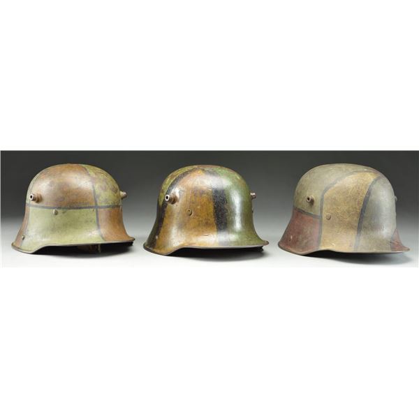 3 WWI GERMAN M1916/17 CAMOUFLAGE HELMETS.