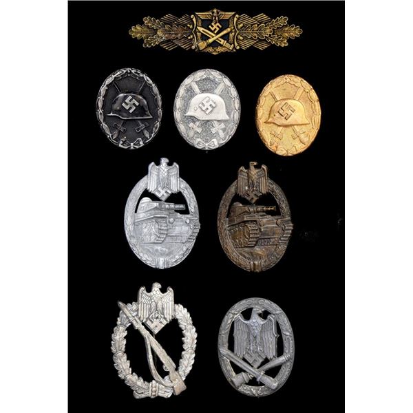 AUTHENTIC & REPRODUCTION WWII GERMAN BADGES.