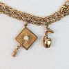 Image 3 : 10K Gold Charm Bracelet - 37 grams total weight