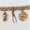 Image 4 : 10K Gold Charm Bracelet - 37 grams total weight