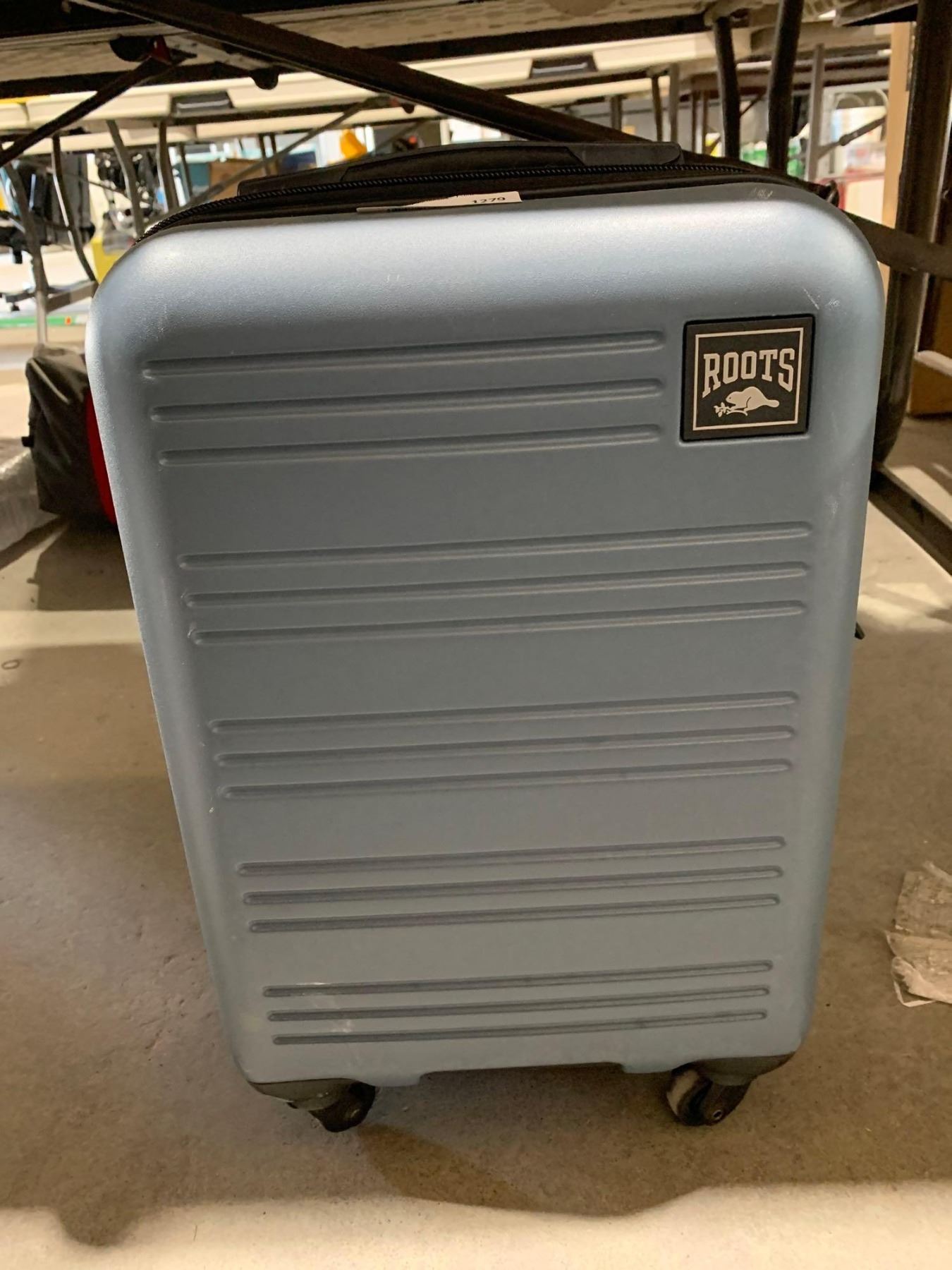 Roots, Carryon Hardshell Rolling Luggage Handle Broken as seen in photos
