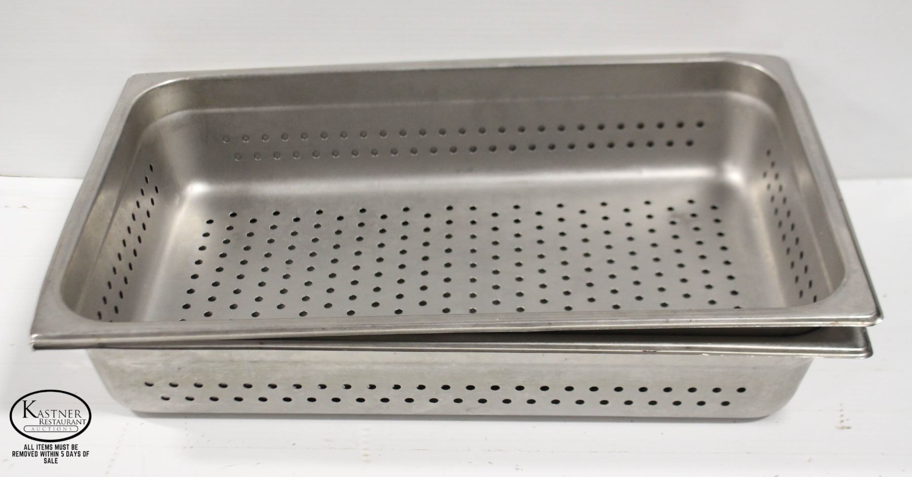 TWO FULL SIZE STAINLESS STEEL PERFORATED INSERTS