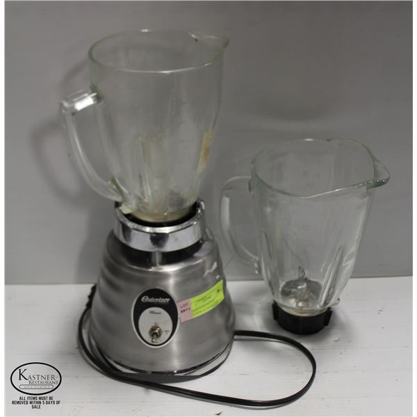 OSTERIZER BLENDER W/ 2 MATCHING GLASS PITCHERS