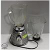 Image 1 : OSTERIZER BLENDER W/ 2 MATCHING GLASS PITCHERS