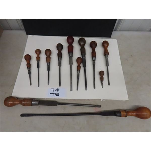 19 Antique Cabinet Screwdrivers, graduated in size.  All wooden handled - 