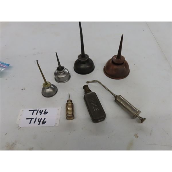 A lot of 7 Vintage Antique Oil Can Thumb Pump Oilers.  The squarish one is 