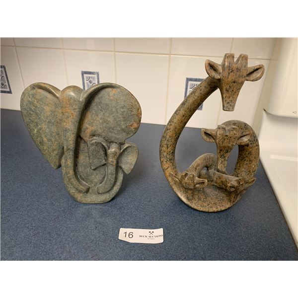 Stone Carvings of Giraffes and Elephants