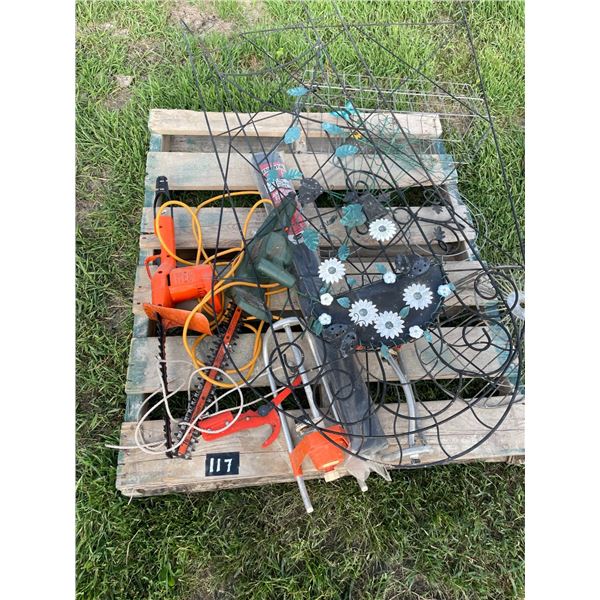 Hedge trimmer/landscape fabric