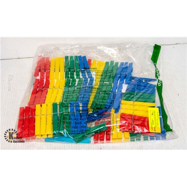 APPROXIMATELY 100 NEW CLOTHES PINS IN A VARIETY OF