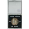 Image 1 : U.S. 1964D John F. Kennedy Silver Half Dollar. Housed in a hard plastic holder that gives his birth 