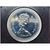 Image 3 : 1976 Library of Parliament Silver Dollar Housed in its original black case of issue. Specimen. Brigh