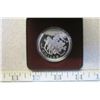 1994 RCMP dog sled Silver Dollar. Housed in its original case of issue. Proof with Ultra Heavy Cameo