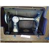 Image 2 : Vintage Singer sewing machine and cabinet including contents