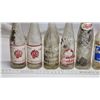 Image 2 : 11 Assorted pop bottles - Coca-Cola, Sun Crest, etc.