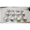 Image 1 : 12 assorted teacups and saucers