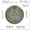 Image 1 : 1934 Silver 50 Cents. Key Date. Mintage of 39,539. F-12.