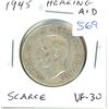 Image 1 : 1945 Silver 50 Cents with Hearing Aid in King’s ear. VF-30. Scarce Error that resulted from a Die Cl