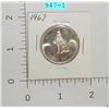 Image 1 : 1967 Canadian Fifty Cent Piece 1967 Wolf carded and plastic case Coin