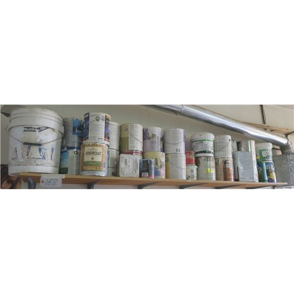 Shelf with Assorted Paints, Primers, Stains, etc.