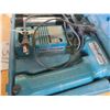 Image 4 : Makita drill with 2 batteries (9.6V) & charger + case