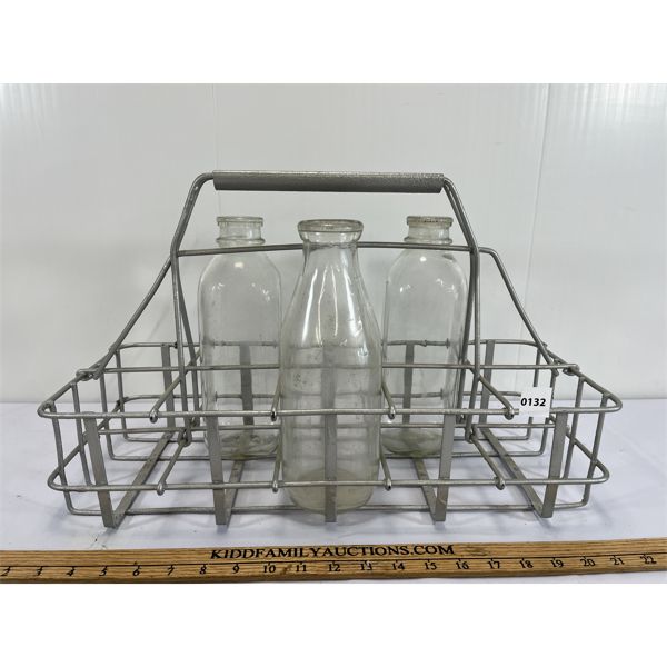 LOT OF 4 - 1QT MILK BOTTLES W/ CARRYING RACK - INCL MILK TOKENS - SEE ALL PICS