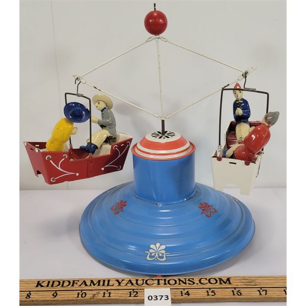 TUCHER & WALTHER TIN CAROUSEL WIND UP TOY