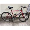 Image 2 : RALEIGH DISCOVERY RED 21 SPEED MOUNTAIN BIKE ( MISSING ONE HANDLE GRIP )