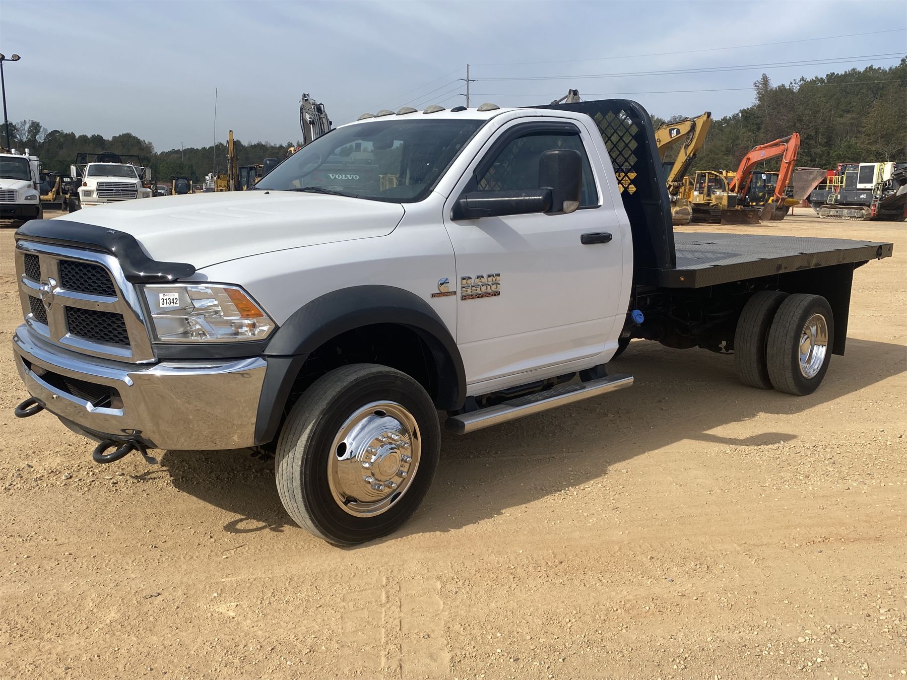 2016 RAM 5500 HEAVY DUTY Flatbed Truck - J.M. Wood Auction Company, Inc.
