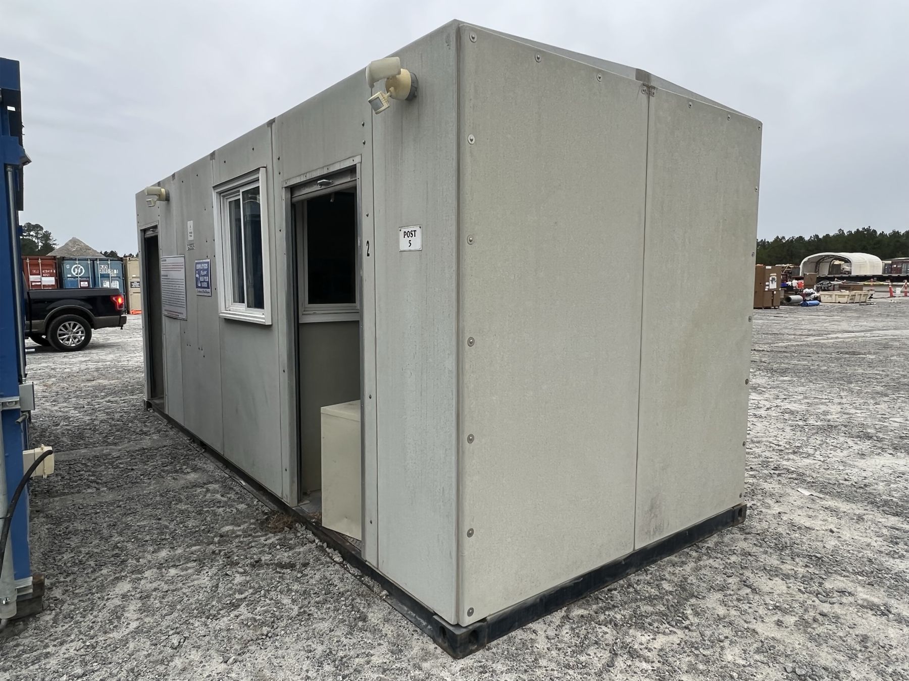 GUARD SHACK/TURNSTYLE SECURITY BUILDING - J.M. Wood Auction Company, Inc.