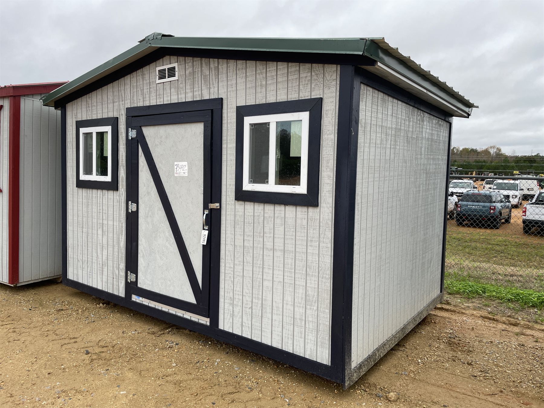 8' x 12' SHED J.M. Wood Auction Company, Inc.