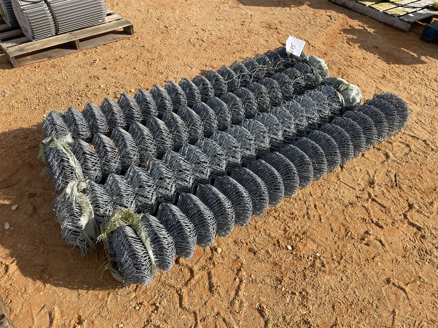 Chain 4 Rols (4) CHAIN LINK FENCE ROLLS - J.M. Wood Auction Company, Inc.